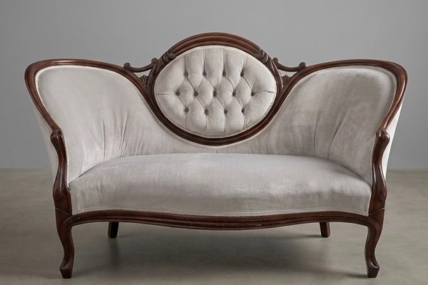 Vintage tufted velvet couch with carved wood frame