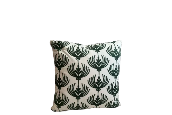 Ivory rental pillow with forest green fan pattern catalog cutout