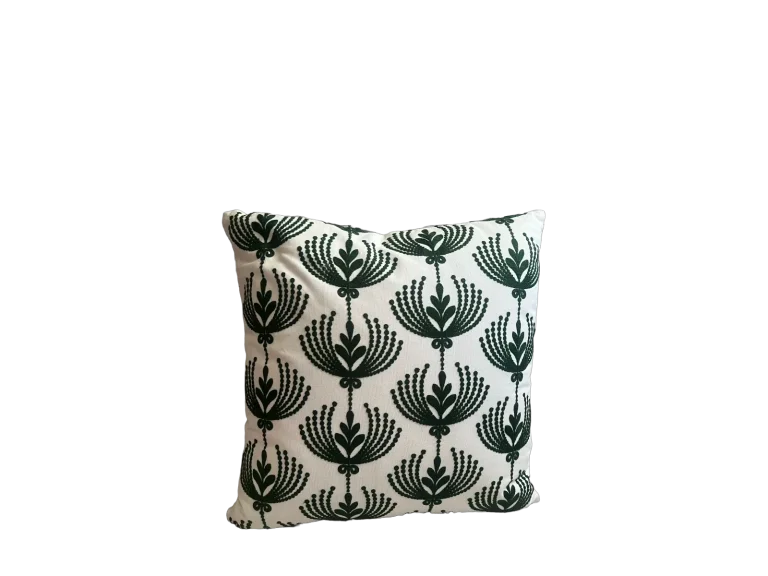 Ivory rental pillow with forest green fan pattern catalog cutout