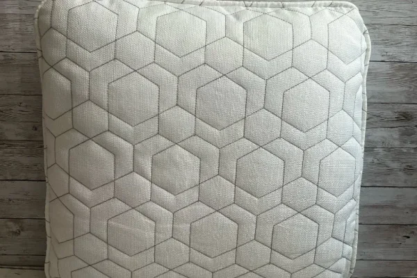 Ivory geometric cube pattern rental pillow