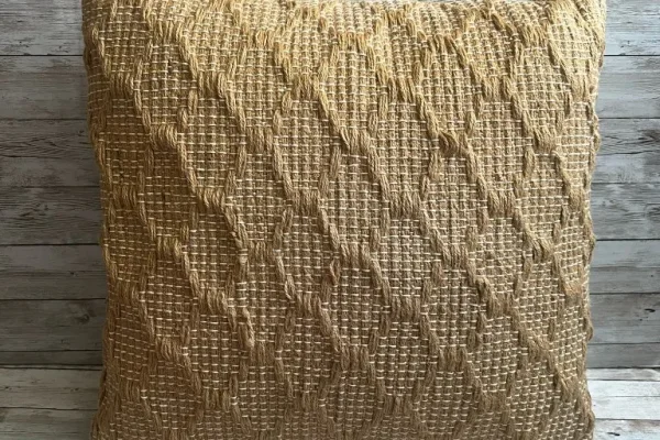 Natural woven textured stripe rental pillow