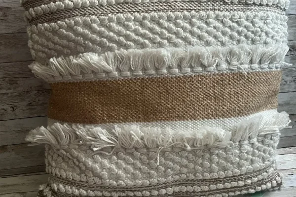 Natural and ivory tufted stripe rental pillow