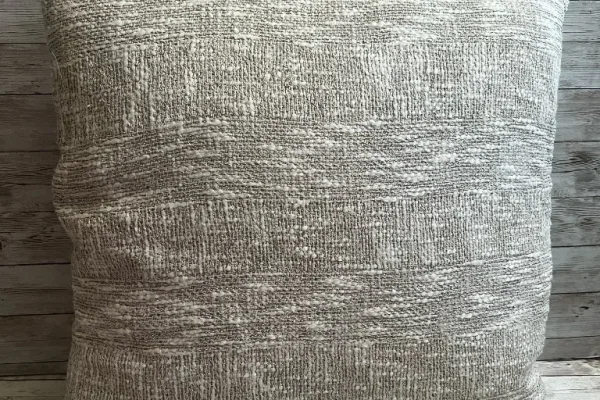 Natural woven stripe rental pillow