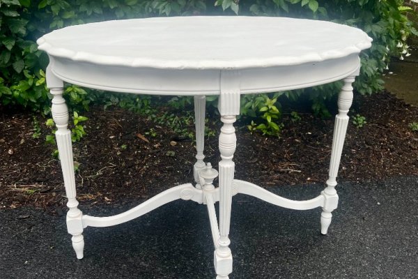 White vintage round display table