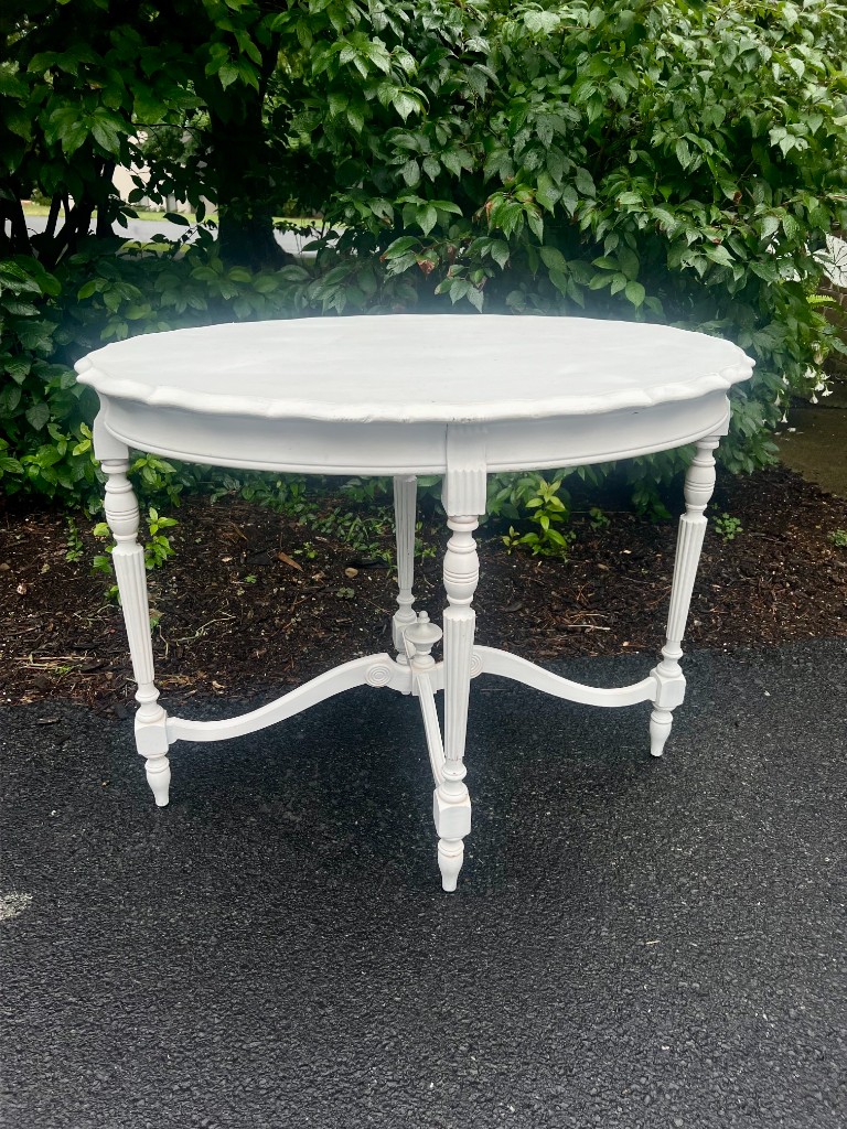 White vintage round display table