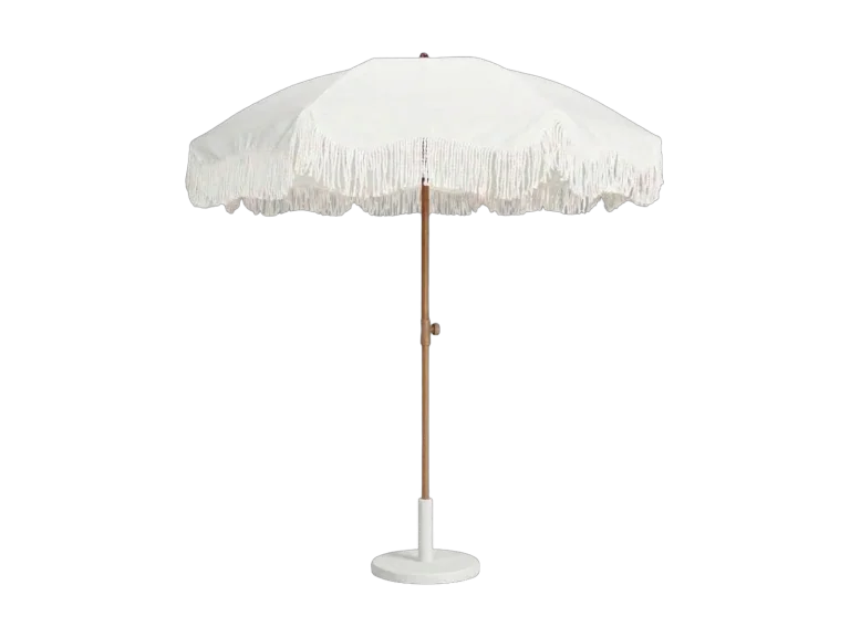 White fringe patio umbrella with base rental catalog cutout
