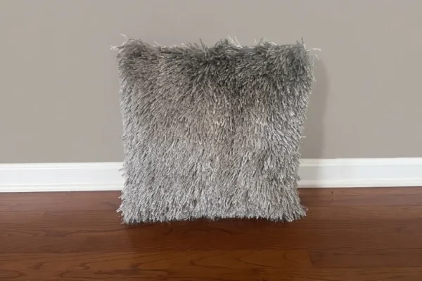 Silver gray fringed rental pillow