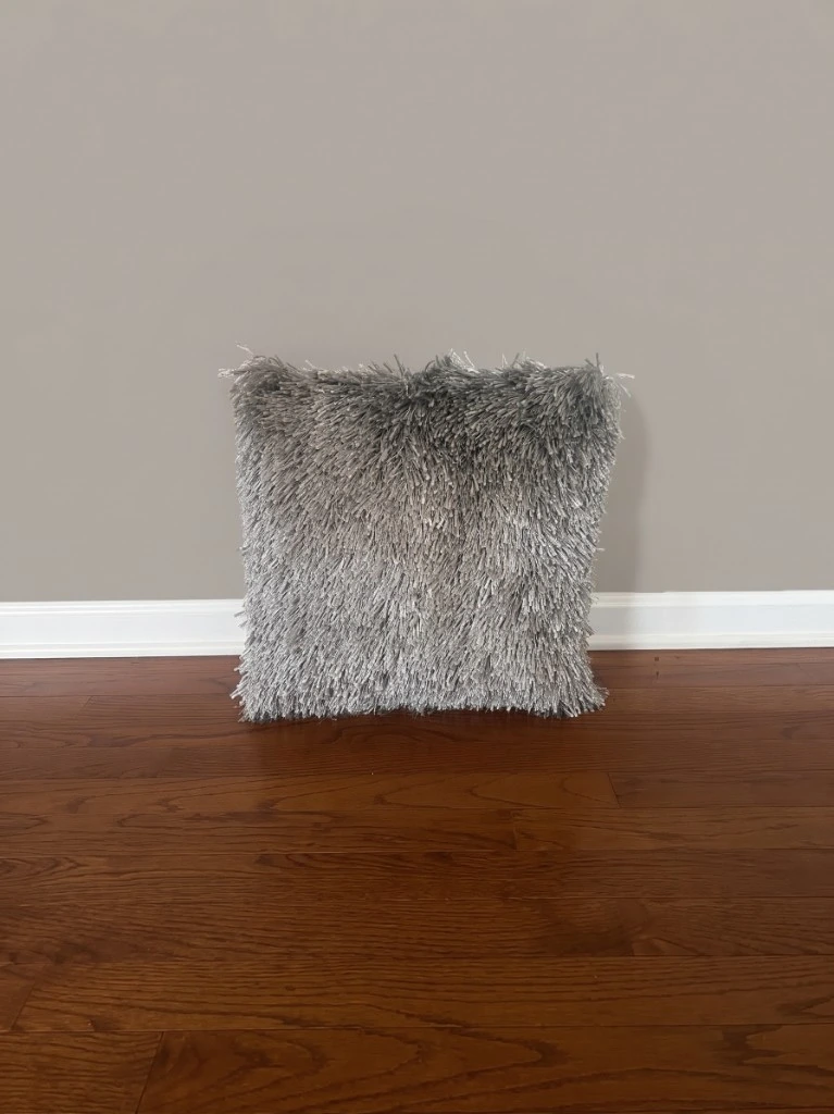 Silver gray fringed rental pillow